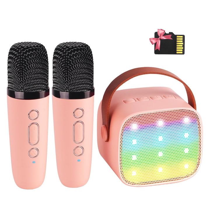 Mini aparat de karaoke pentru copii cu 2 microfoane fara fir Overtang 18 cantece 4 ani+ Roz