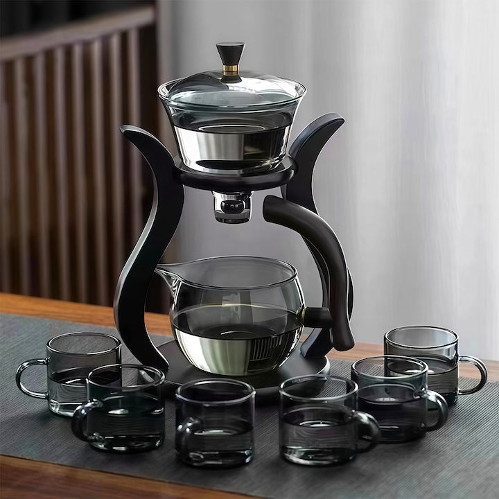 Semi-automatic teapot made of heat-resistant glass. Glass teapot set with 6 cups, magnetic flow adjustment. Ideal for home, office, holidays or daily use. Elegant design, easy to clean. Grey.