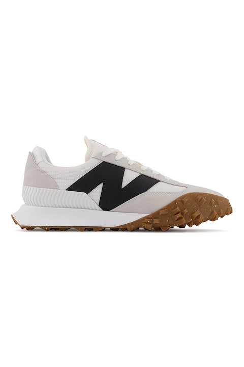 New Balance - Suede and mesh sneakers Faded black/Off-white 12 interest-free installments